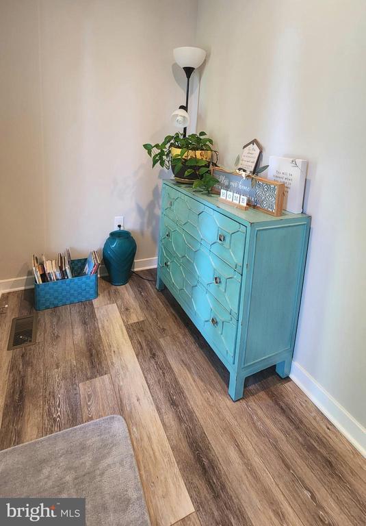 130 Almond St S, Orange, VA 22960 - room details with baseboards, visible vents, and wood finished floors