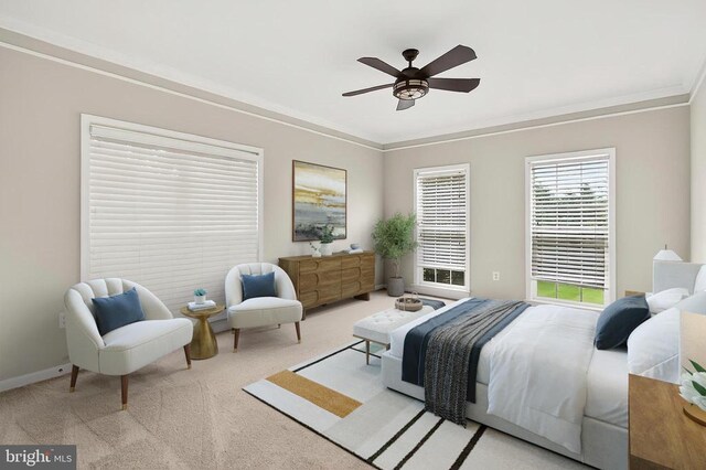  - bedroom with ornamental molding, carpet floors, and ceiling fan