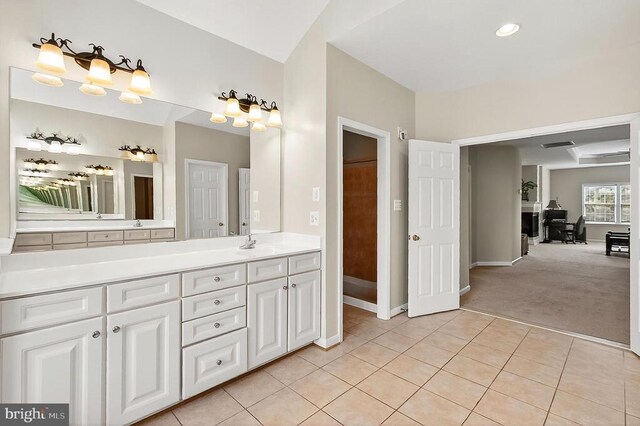  - bathroom with double vanity and tile patterned flooring