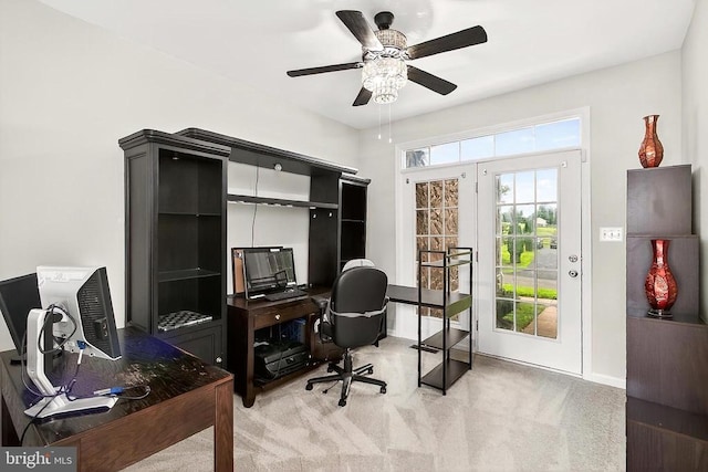  - office area with light colored carpet and ceiling fan