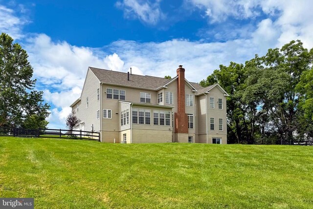  - back of house with a chimney