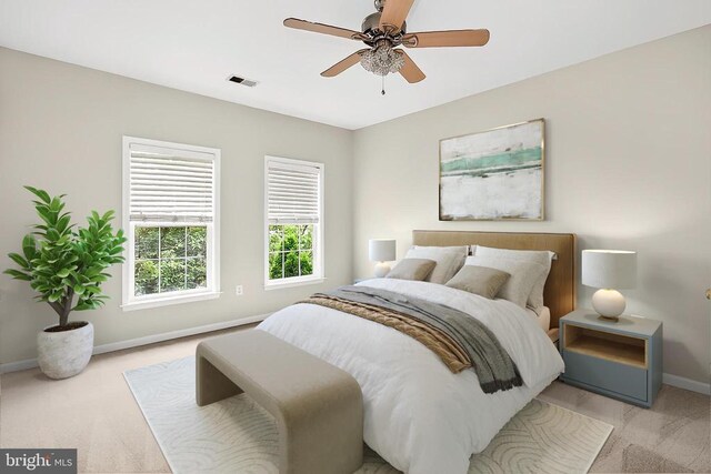 - unfurnished bedroom featuring carpet floors, crown molding, ensuite bathroom, and ceiling fan