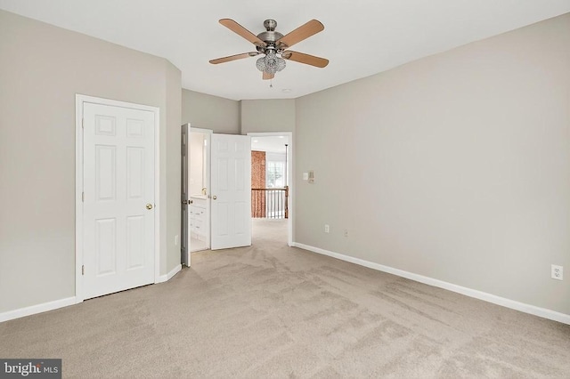  - unfurnished bedroom featuring carpet floors and ceiling fan
