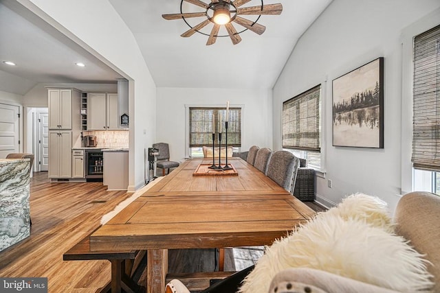 295 Hemlock Loop, Mineral, VA 23117 - dining room featuring lofted ceiling, beverage cooler, ceiling fan, light wood finished floors, and recessed lighting