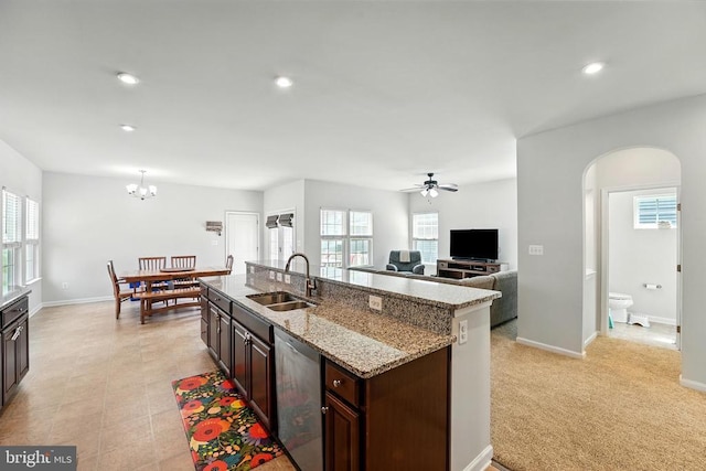  - kitchen with dishwasher, healthy amount of natural light, a ceiling fan, arched walkways, and recessed lighting