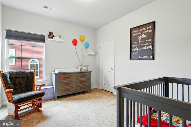  - bedroom with light carpet and baseboards