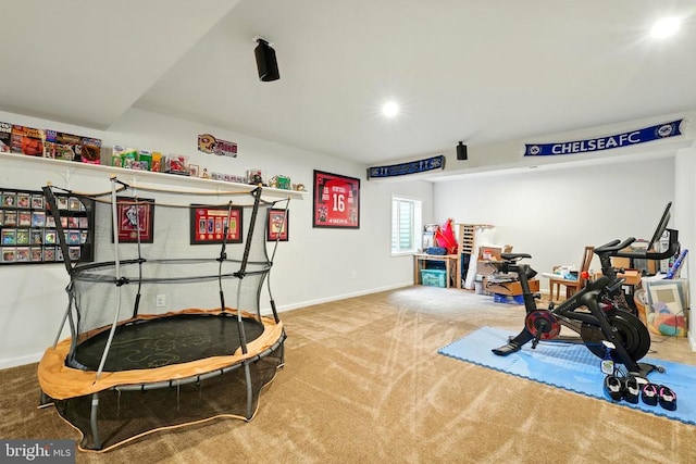  - rec room with carpet flooring and baseboards
