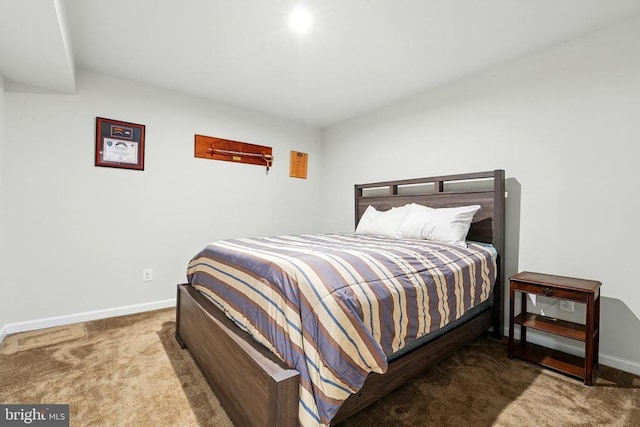  - carpeted bedroom featuring baseboards