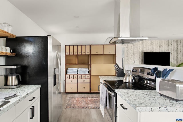 1795 Avon Rd, Afton, VA 22920 - kitchen featuring stainless steel appliances, wall chimney exhaust hood, open shelves, light wood-style floors, and light countertops