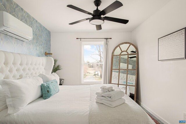 1795 Avon Rd, Afton, VA 22920 - bedroom with a wall mounted AC, access to outside, baseboards, ceiling fan, and wood finished floors