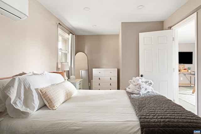 1795 Avon Rd, Afton, VA 22920 - bedroom featuring a wall unit AC, arched walkways, and recessed lighting