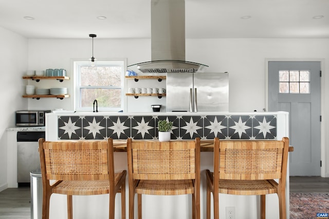 1795 Avon Rd, Afton, VA 22920 - kitchen featuring island range hood, stainless steel appliances, wood finished floors, healthy amount of natural light, and recessed lighting