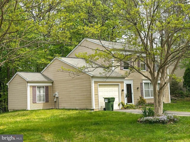5903 Vista Ct, Fredericksburg, VA 22407 - view of front facade with a garage and a front yard