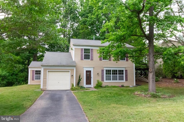 5903 Vista Ct, Fredericksburg, VA 22407 - colonial inspired home with a garage, driveway, and a front yard