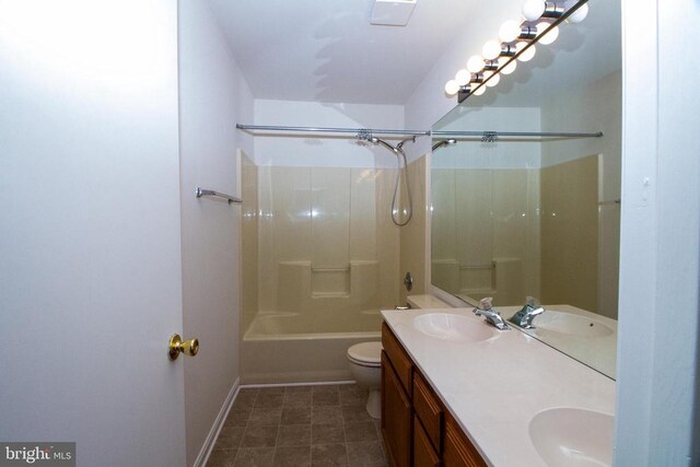 5903 Vista Ct, Fredericksburg, VA 22407 - full bath featuring toilet, double vanity, baseboards, and bathtub / shower combination