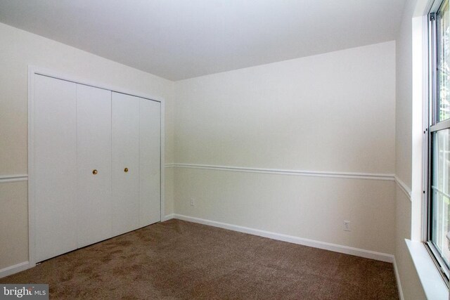5903 Vista Ct, Fredericksburg, VA 22407 - unfurnished bedroom with carpet floors, a closet, and baseboards