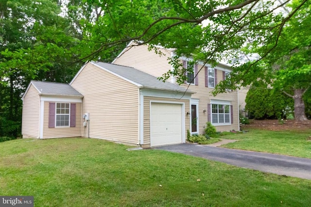 5903 Vista Ct, Fredericksburg, VA 22407 - colonial house featuring an attached garage, driveway, and a front lawn