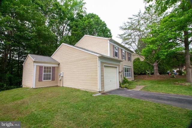 5903 Vista Ct, Fredericksburg, VA 22407 - view of side of property with asphalt driveway, a yard, and an attached garage