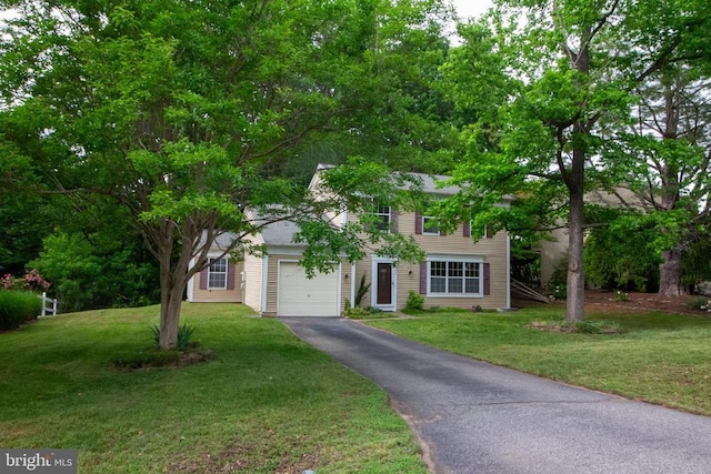 5903 Vista Ct, Fredericksburg, VA 22407 - view of front of property featuring asphalt driveway, a front lawn, and an attached garage