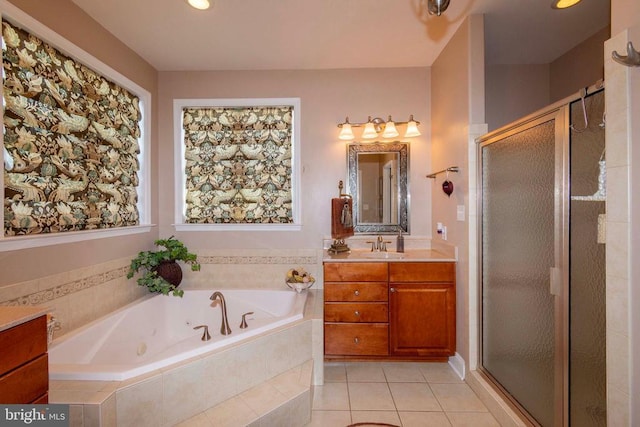 full bathroom with a stall shower, recessed lighting, tile patterned floors, vanity, and a tub with jets