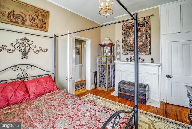 215 Fredericksburg Ave, Louisa, VA 23093 - bedroom with crown molding and wood finished floors