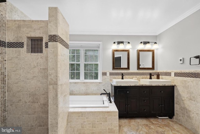 2357 Brighton Pl, Jeffersonton, VA 22724 - bathroom featuring double vanity, tile walls, a bath, ornamental molding, and wainscoting