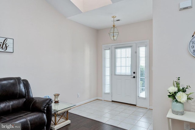 11313 Macon Dr, Fredericksburg, VA 22407 - foyer with light wood-style floors and baseboards