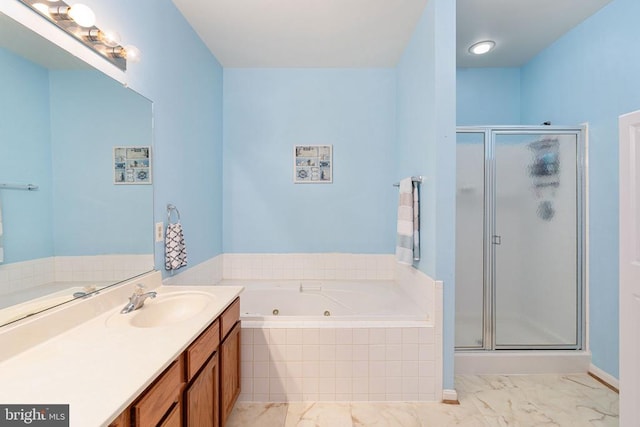 11313 Macon Dr, Fredericksburg, VA 22407 - bathroom featuring marble look tiles, a shower stall, a tub with jets, and vanity