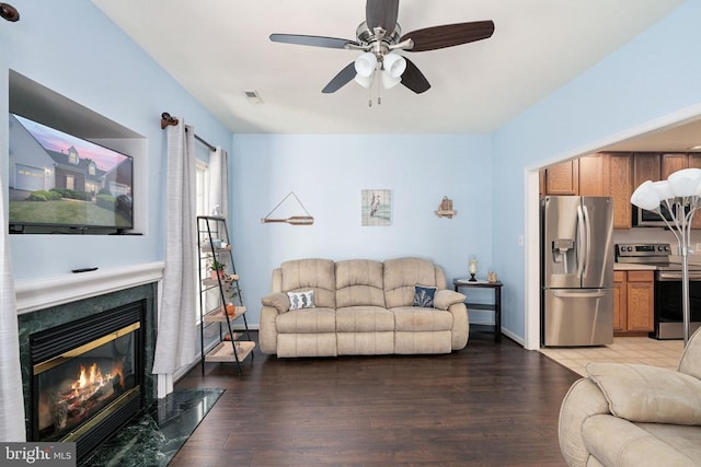 11313 Macon Dr, Fredericksburg, VA 22407 - living area with a ceiling fan, wood finished floors, and a high end fireplace