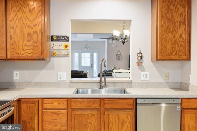 11313 Macon Dr, Fredericksburg, VA 22407 - kitchen featuring stainless steel appliances, light countertops, a chandelier, and brown cabinetry