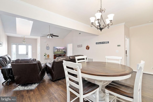 11313 Macon Dr, Fredericksburg, VA 22407 - dining area featuring dark wood-style flooring, a chandelier, a ceiling fan, ornamental molding, and lofted ceiling