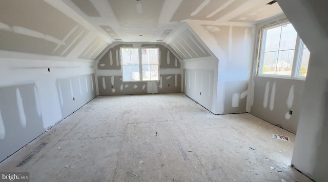 additional living space with lofted ceiling and a wealth of natural light