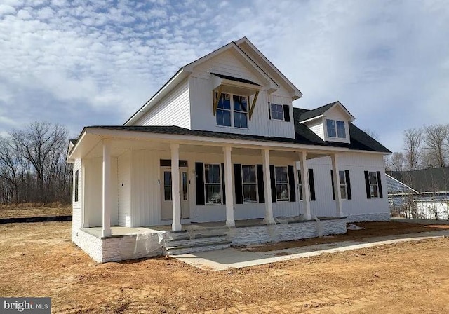 view of front of property featuring a porch and board and batten siding