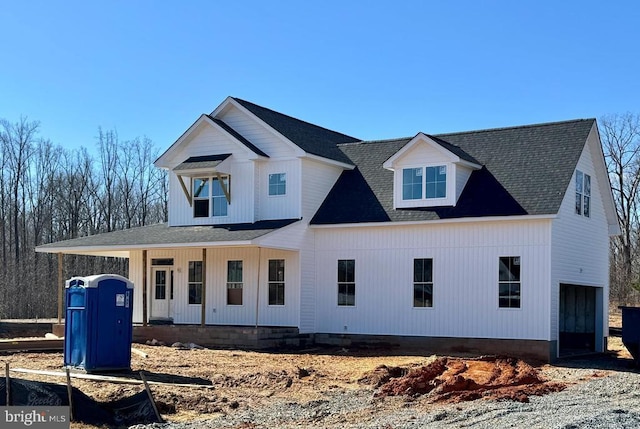 view of front of home featuring a garage and covered porch