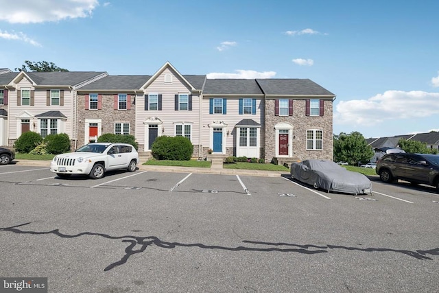 3103 Alliance Ct, Fredericksburg, VA 22408 - multi unit property featuring uncovered parking and stone siding