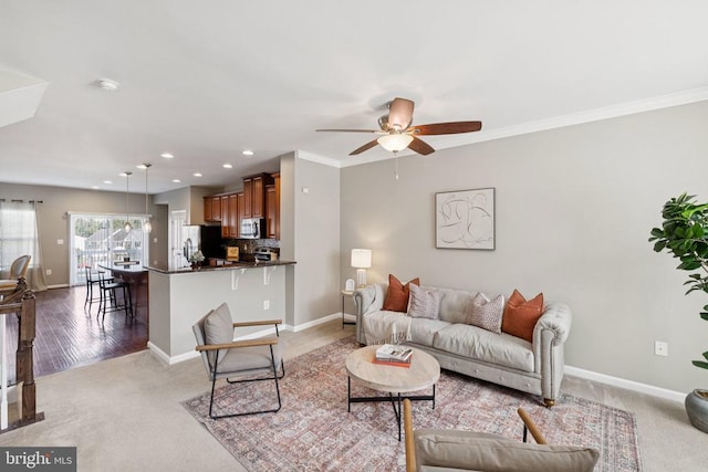 3103 Alliance Ct, Fredericksburg, VA 22408 - living room with ceiling fan, recessed lighting, ornamental molding, and light colored carpet