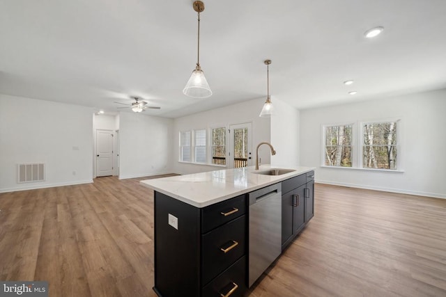 201 Zion Manor Rd Lot 13, Gordonsville, VA 22942 - kitchen featuring a sink, stainless steel dishwasher, open floor plan, dark cabinetry, and light wood finished floors