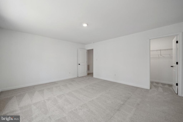 201 Zion Manor Rd Lot 13, Gordonsville, VA 22942 - unfurnished bedroom with carpet flooring, baseboards, a walk in closet, a closet, and recessed lighting