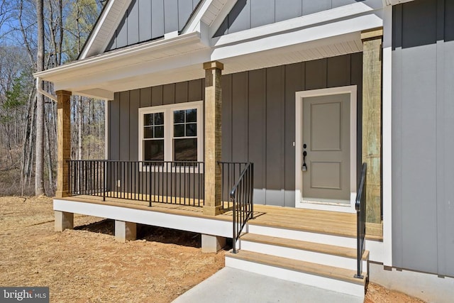 201 Zion Manor Rd Lot 13, Gordonsville, VA 22942 - view of exterior entry with board and batten siding and a porch