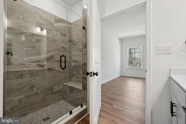 201 Zion Manor Rd Lot 13, Gordonsville, VA 22942 - bathroom featuring wood finished floors, a shower stall, vanity, and baseboards
