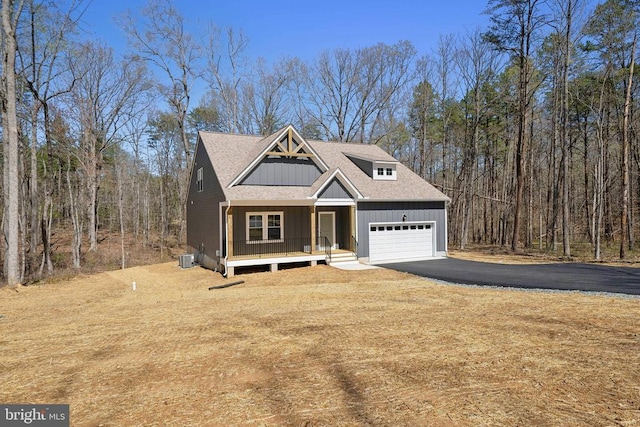 201 Zion Manor Rd Lot 13, Gordonsville, VA 22942 - view of front of home featuring covered porch, driveway, a garage, board and batten siding, and roof with shingles