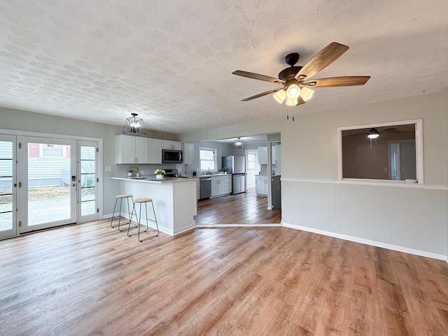 6 Maple Dr, Verona, VA 24482 - kitchen featuring open floor plan, light countertops, a peninsula, and appliances with stainless steel finishes