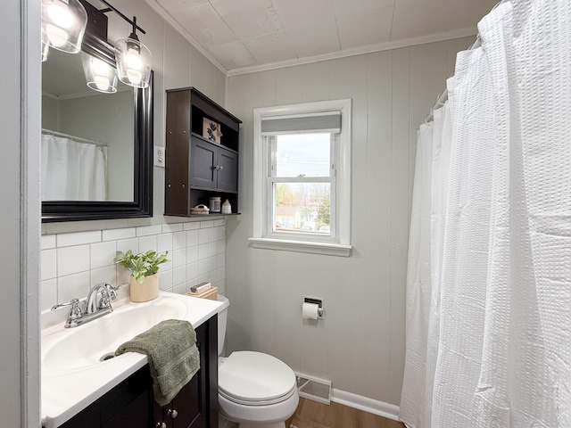 6 Maple Dr, Verona, VA 24482 - bathroom with toilet, visible vents, vanity, crown molding, and wood finished floors
