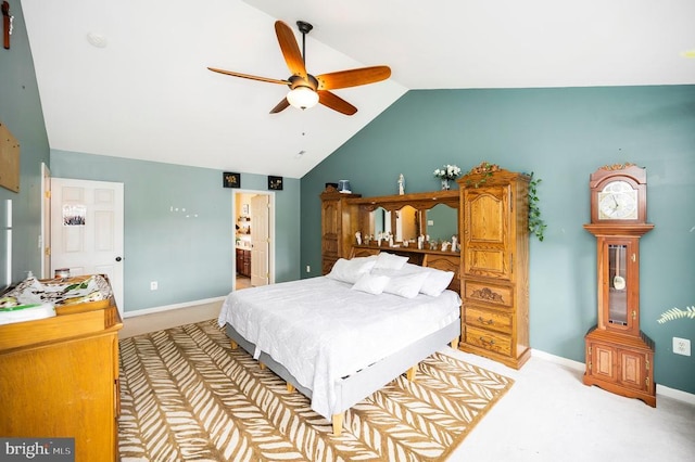 6733 Averett Ct, Fredericksburg, VA 22407 - bedroom with lofted ceiling, light carpet, connected bathroom, and baseboards