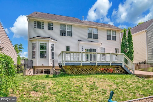 6733 Averett Ct, Fredericksburg, VA 22407 - rear view of house with a yard, fence, stairway, and a deck