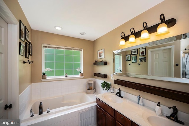 6733 Averett Ct, Fredericksburg, VA 22407 - full bathroom featuring double vanity, a bath, and a sink