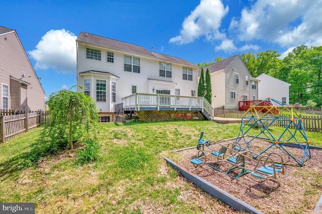 6733 Averett Ct, Fredericksburg, VA 22407 - rear view of property featuring a deck, a lawn, and a fenced backyard