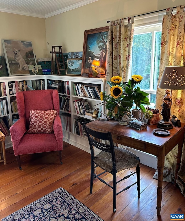 office area featuring hardwood / wood-style flooring and crown molding