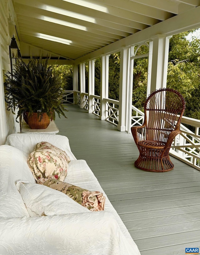 sunroom / solarium with beam ceiling
