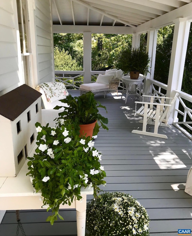 wooden terrace with covered porch